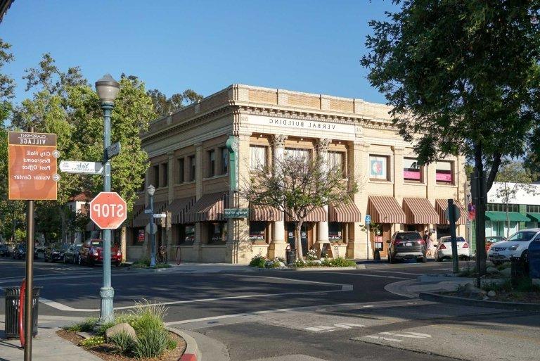 a street scene of the claremont village, the corner of second st. and Yale